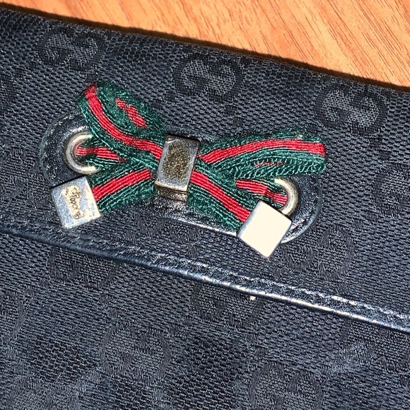 Authentic Gucci Monogram GG Canvas Flap Wallet with Bow - Picture 2 of 16
